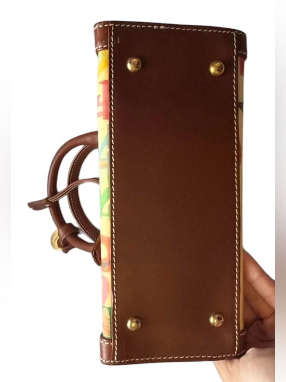 Dooney & Bourke graffiti signature multicolor coated handbag.